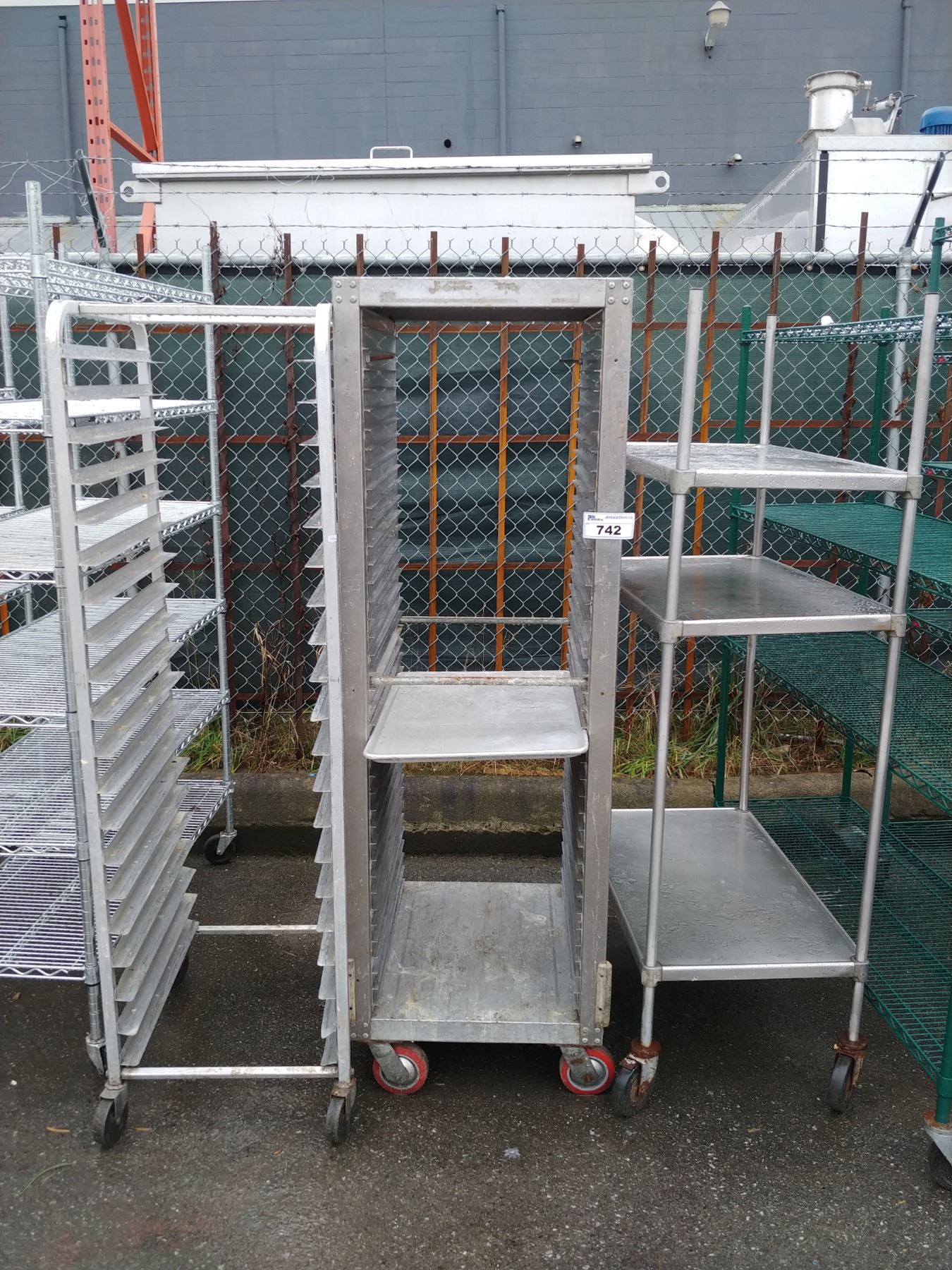 3 METAL RESTAURANT RACKS - Able Auctions