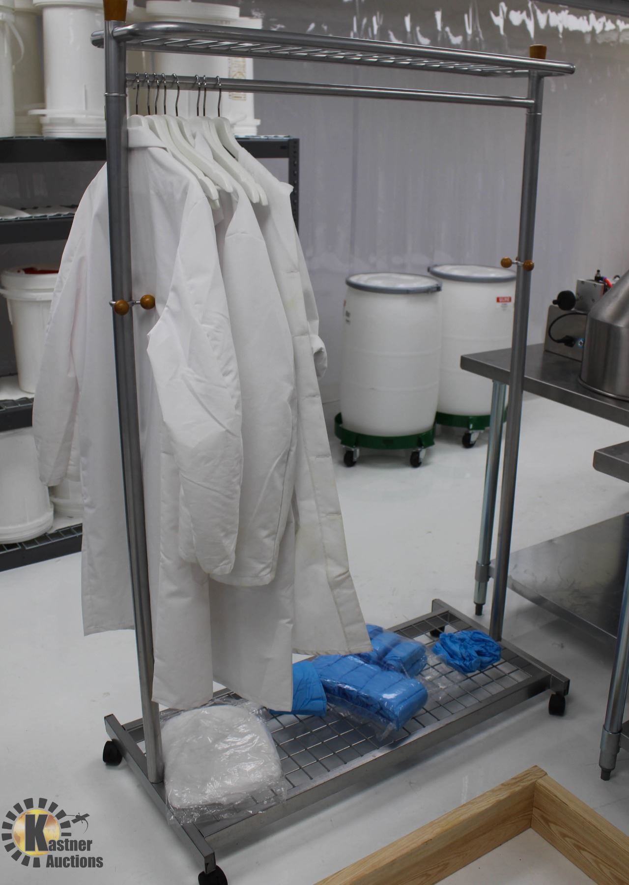 MOBILE CLOTHING RACK W/ SHOE COVERS & LAB COATS