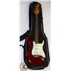 Image 1 : JAY TURSER ELECTRIC RED GUITAR WITH SOFT CASE.