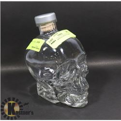 EMPTY CRYSTAL HEAD VODKA BOTTLE.