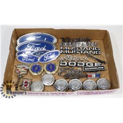 LOT OF 26 AUTO BADGES AND WHEEL CENTER CAPS