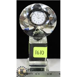 SMALL CRYSTAL STATUE HOLDING WATCH IN GEM