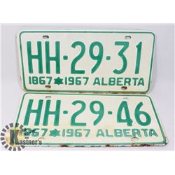 LOT OF TWO 1967 CENTENNIAL LICENSE PLATES.