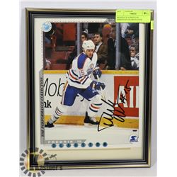 SIGNED 8 X 10 PHOTO OF EDMONTON OILERS PLAYER