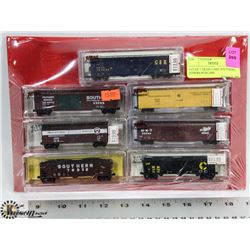 LOT OF 7 TRAIN CARS. SOUTHERN, OTHERS BOXCARS