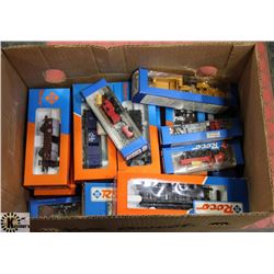 BOX OF ROCO TRAIN CARS AND VEHICLES. HO SCALE.