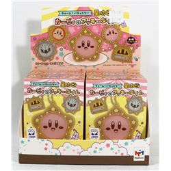 FOUR BOXES IN A FLAT OF KIRBY MERCHANDISE.