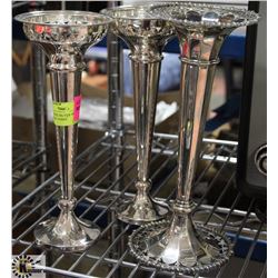 SET OF THREE SILVER PLATED BIRKS STEM VASES.