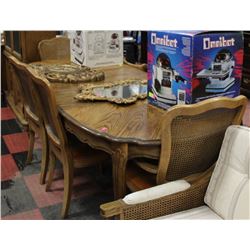 WOOD TONE TABLE W/4 WOOD AND WICKER CHAIRS