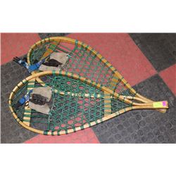 A PAIR OF VINTAGE WOODEN SNOWSHOES