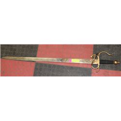 ORNATE GOLD TONE SPANISH SWORD MARKED TOLEDO.