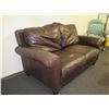 Image 2 : Brown Leather-Like Loveseat w/ 2 Cushions