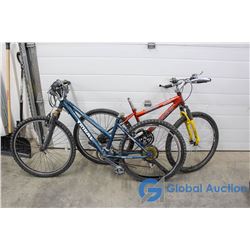 26  Women's Tribal Mountain Bike (Blue) & Men's Norco Mountain Bike (Orange)