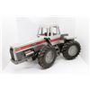 Image 1 : White 4-175 tractor plastic  10in long