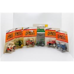 Various 1:64 scale tractors