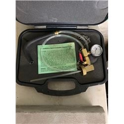 Anti lock pressure test gauge, shift bearing removal tool and combustion chamber cleaning tool