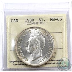 Silver $1 1939 ICCS Certified MS-65. Bright coin with subtle hints of golden throughout the borders.