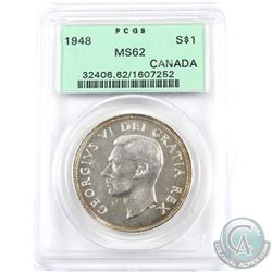Silver $1 1948 PCGS Certified MS-62. Nice white key date coin with golden toning around both sides o