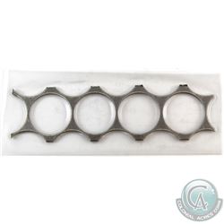 25-cent Canada Planchet Strip of 4 Complete Coin Punches. Strip is magnetic and weighs 10.5 grams.*S