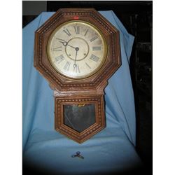 Antique wall clock by Wm L Gilbert Clock Co