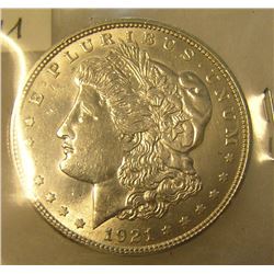 1921D Morgan silver dollar in AU condition