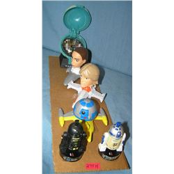 Group of vintage Star Wars toys and collectibles