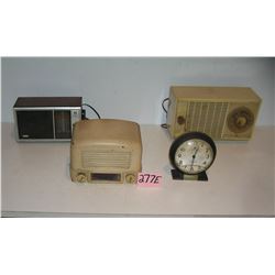 Group of old radios and a Big Ben alarm clock