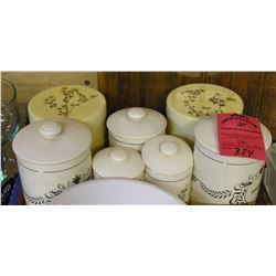 Group of vintage canisters and serving tray