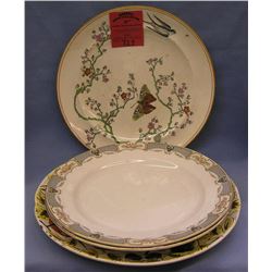 Group of 4 floral decorated serving plates