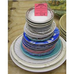 Large group of vintage serving plates and bowls
