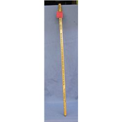 Antique yardstick with Tam Bay advertising