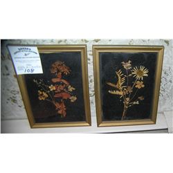 Pair of leaf decorated art pieces both framed