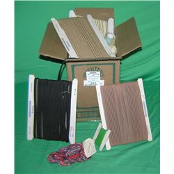 Box full of vintage sewing and knitting accessories