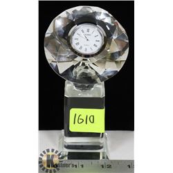 SMALL CRYSTAL STUE HOLDING WATCH IN GEM