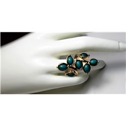 21)  GOLD TONE WITH GREEN GEMSTONES