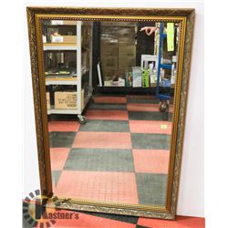 GOLD TONED FRAMED MIRROR