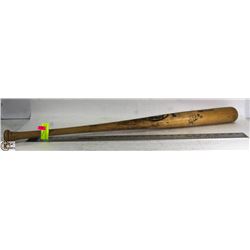 GAME USED AND SIGNED BASEBALL BAT