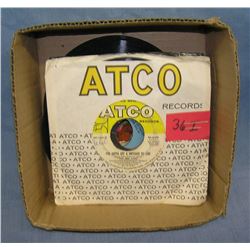 Box of vintage 45 RPM records