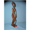 Image 1 : Hand carved African man playing the bongoes