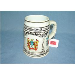 Multiple crest decorative beer stein