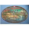 Image 1 : What Happens at the Cabin Stays in the Cabin sign