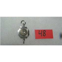 Syracuse University graduation pendant dated 1955