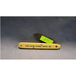 Antique celluloid advertising pocket knife