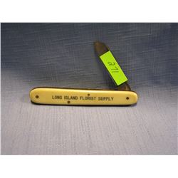 Antique celluloid advertising pocket knife