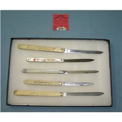 Early celluloid and stainless steel advertising fruit