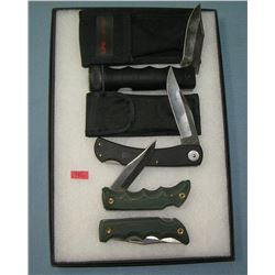 Collection of pocket and survival knives and cases