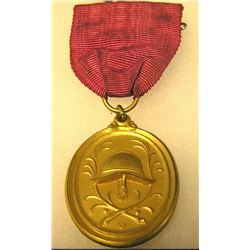 WWII Nazi Germany gold badge and ribbon