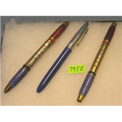 Group of three antique pens