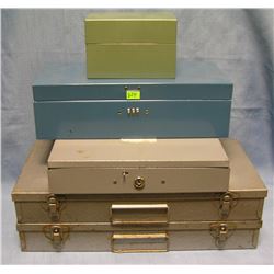 Group of four metal storage boxes