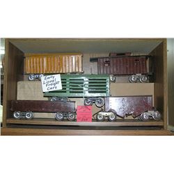 Group of five early Lionel freight cars